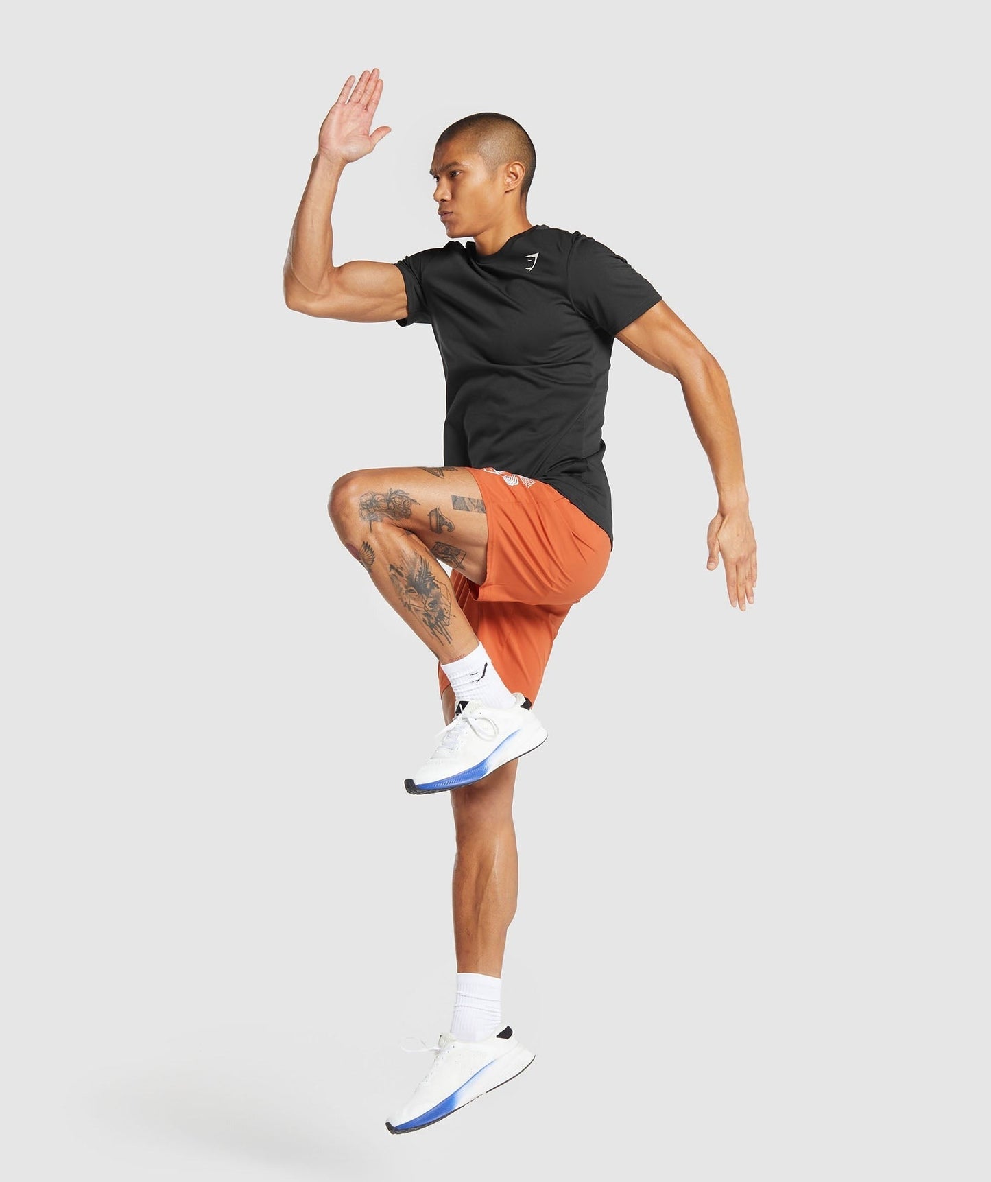 Gymshark Hybrid Wellness 7" Shorts - Rust Orange