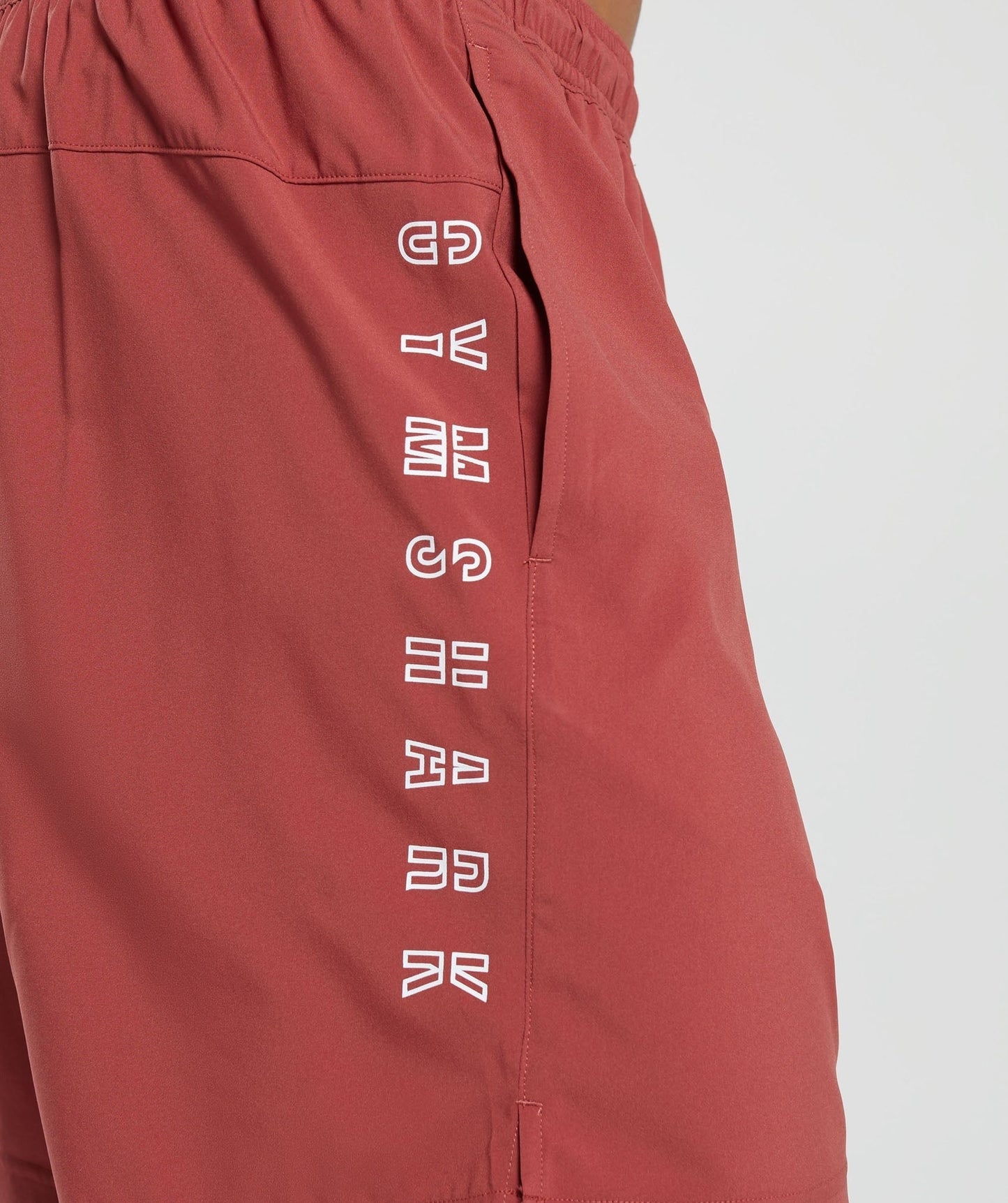 Gymshark Strike Shorts - Rust Red