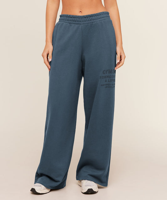 Gymshark Stacked Graphic Wide Leg Joggers - Stealth Blue