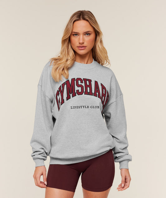 Gymshark Collegiate Graphic Crew Neck Pullover - Light Grey Core Marl/GS Sets Red