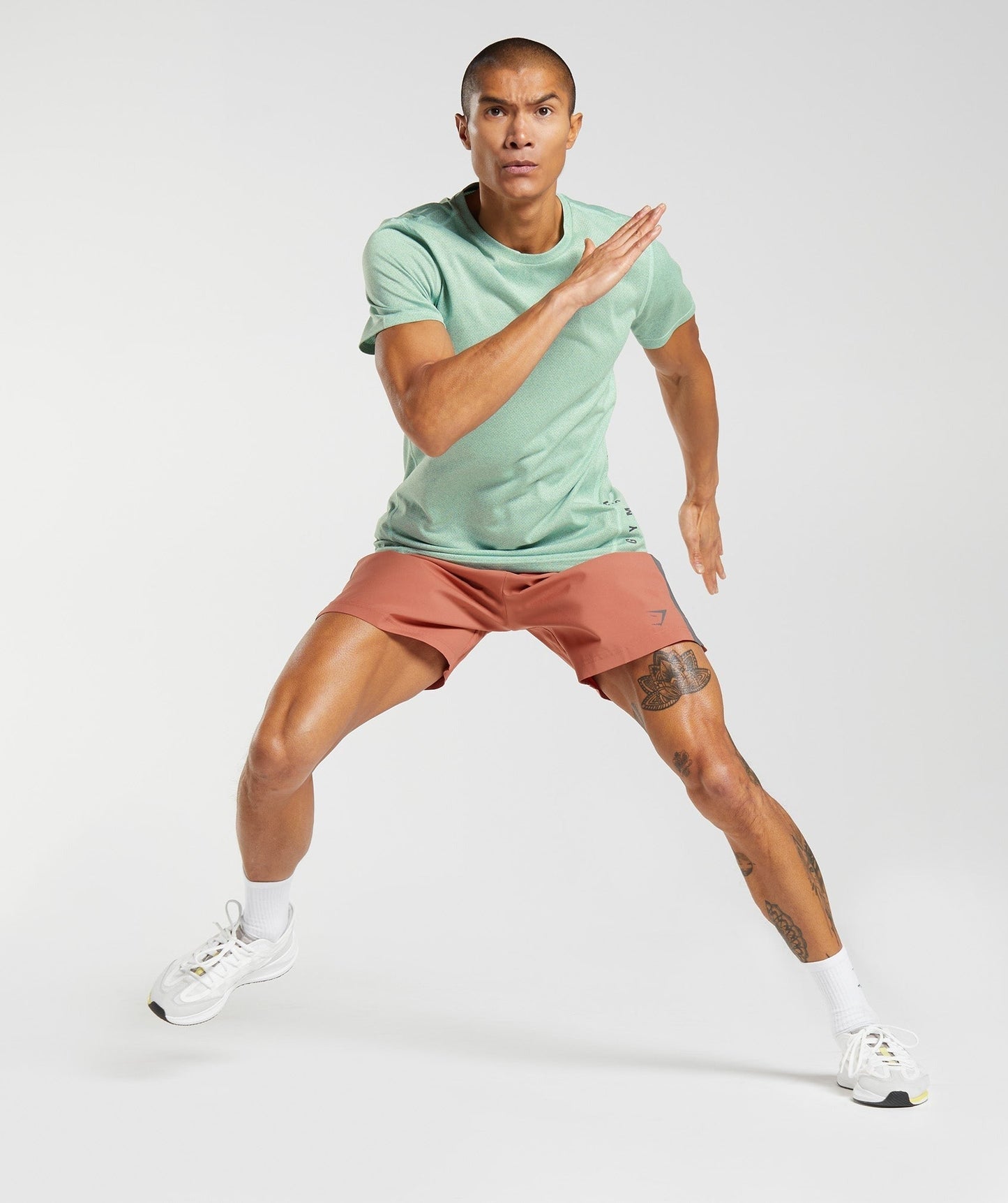 Gymshark Sport 7" Shorts - Persimmon Red/Silhouette Grey